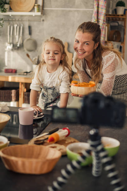 istock Two generations being influencers for a healthy vegan channel 1212918469