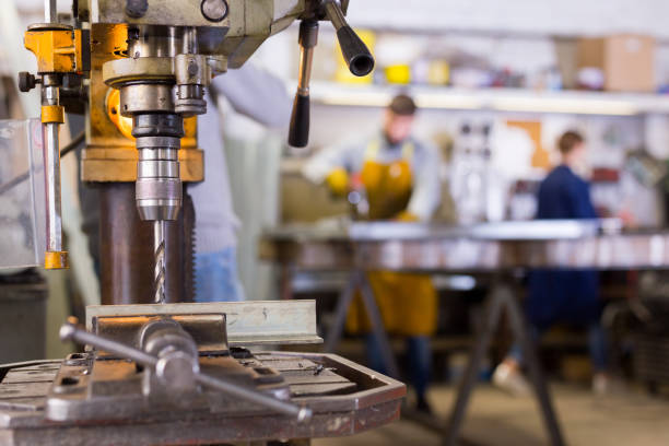 istock Workshop of industrial manufacture with drill machine 1212918771