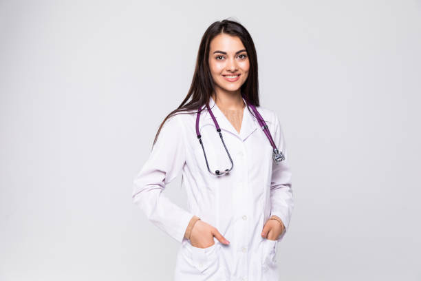 istock Beautiful young doctor with stethoscope isolated on white background 1212919223