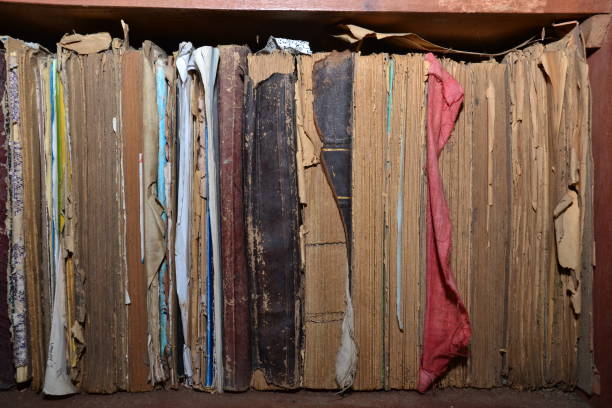 istock Old books at the old bookshelf 1212924285