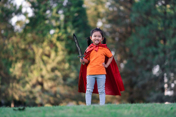 istock Wonder Girl Holding a Sword 1212926669