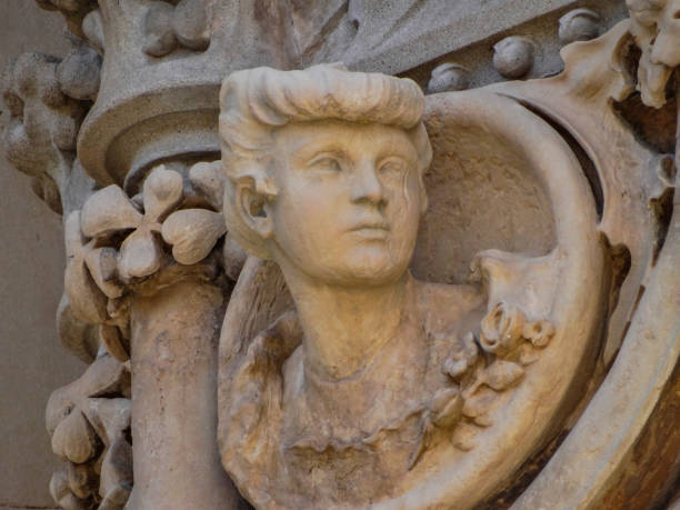 Reus, Catalonia/Spain; May 23 2015: Casa Navas, decorative human stone figure, modernisme house, facade detail, Reus, Tarragona, Catalonia, Spain