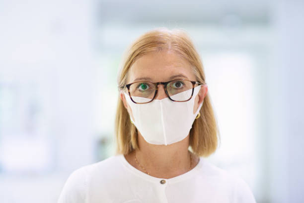 istock Senior woman in face mask. Virus outbreak. 1212927349