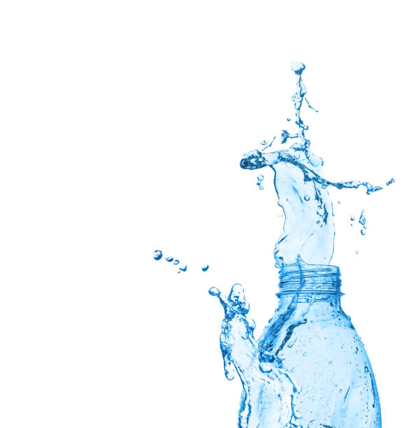 istock Water splash out of a plastic bottle isolated on white. 1212927915