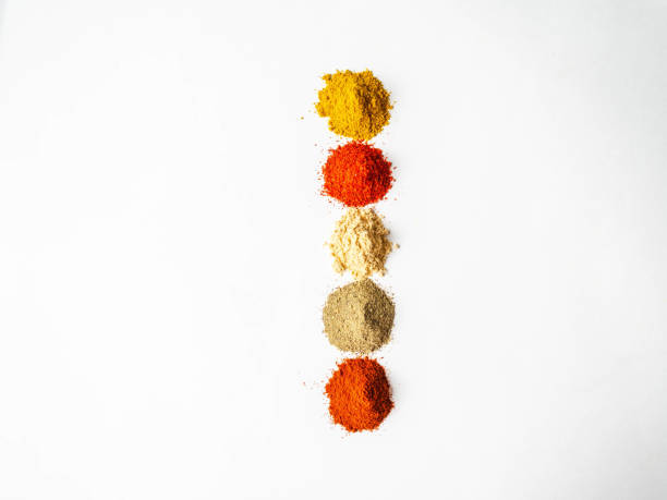 istock Various dry spices pile on a white background 1212928420