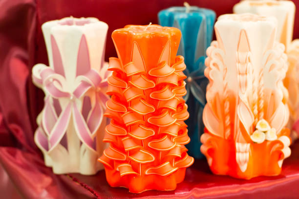 Sale, shop, shopping. Candles on shelf in decoration shop. Decor, design, craft, decoration shop. Wick, paraffin or wax od various colors, decor.