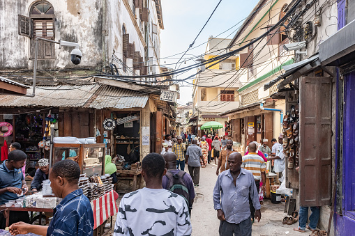 Zanzibar, Tanzania - February 21, 2019: local  people in the crowded Streets of Stone Town, Zanzibar