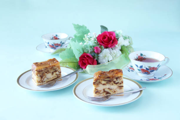 apple cake and tea and red roses apple cake and tea and red roses
(red rose swag) tea party horizontal nobody indoors stock pictures, royalty-free photos & images