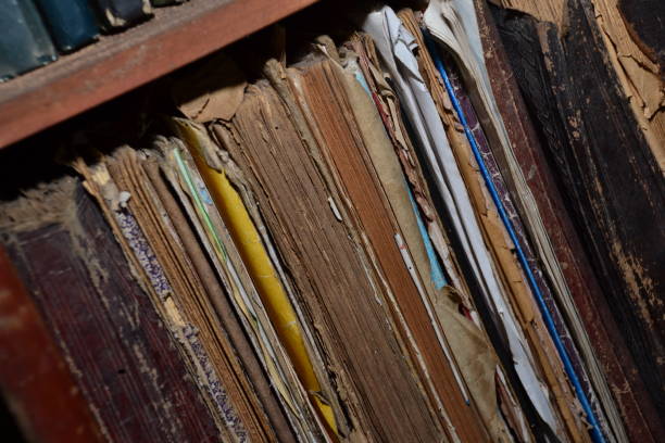 istock Old books at the old bookshelf 1212931393