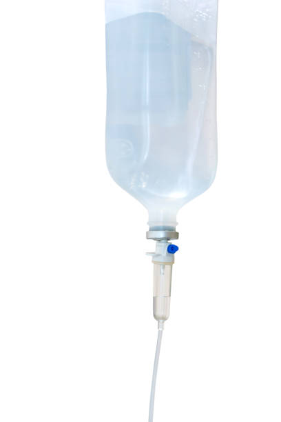 istock Normal saline solution or sodium chloride with infusion bottle drip for patient in hospital isolate on white background 1212932055