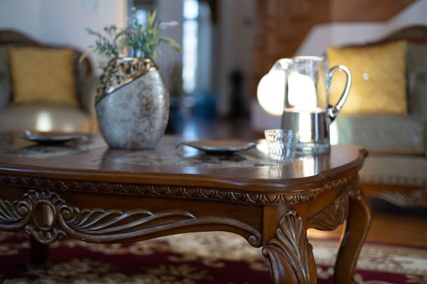 istock Elegant Table with a vase and glass of water pitcher 1212934657