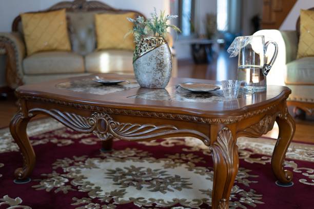 istock Elegant Table with a vase and glass of water pitcher 1212934698