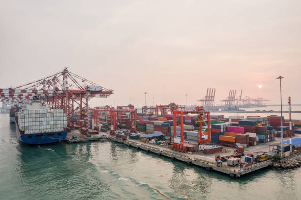 istock Container port and container ship transportation at Colombo. 1212936434
