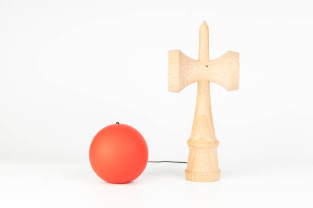 Kendama on white background Kendama(Cup-and-ball Toy) is a traditional japanese wood toy kendama traditional japanese toy stock pictures, royalty-free photos & images
