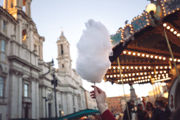 istock White cotton candy in front of a carousel horse 1212938259