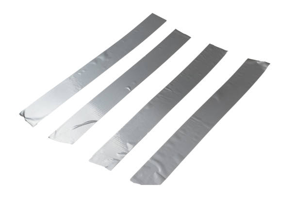 istock Silver scotch tape pieces isolated on white background. 1212944116