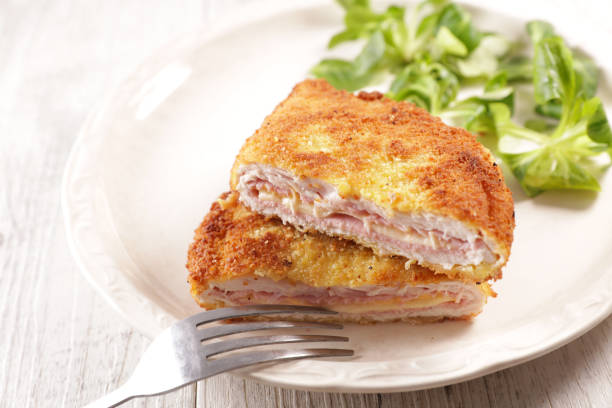 istock cordon bleu- breaded chicken fillet with ham and cheese 1212944951