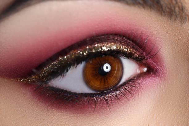 Violet eye. Concept of demonstrating color of the year 2022.