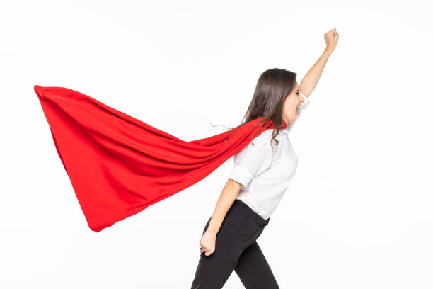 istock YOUNG business woman have large ambition dreaming become superhero solving all difficulty problem about the world showing isolated on the white background with copyspace. 1212946837