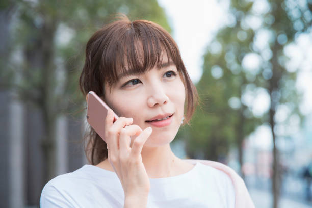 istock A woman talking on a smartphone 1212947406