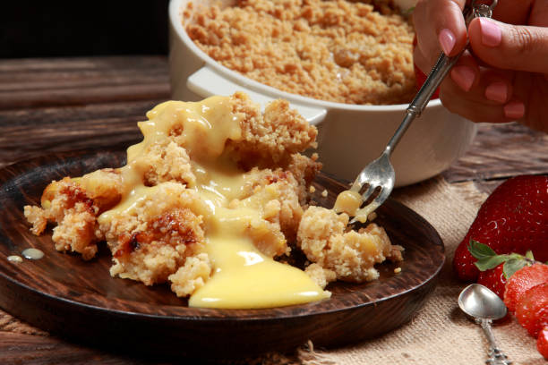 istock Traditional British Apple Crumble with Custard 1212947415