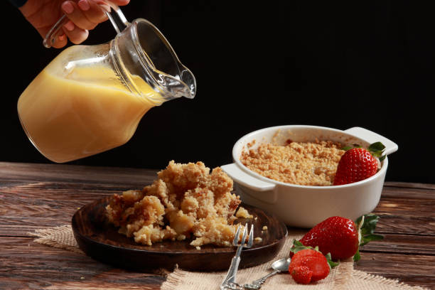 istock Traditional British Apple Crumble with Custard 1212947419
