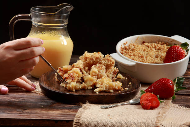 istock Traditional British Apple Crumble with Custard 1212947431