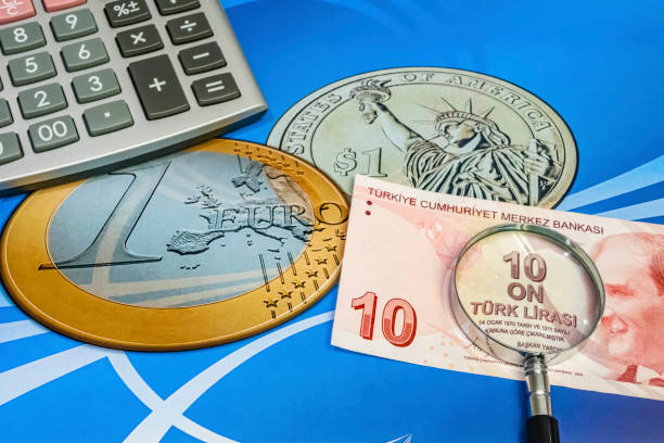 istock close up turkish lira banknotes with calculator and magnifier on background 1212947789