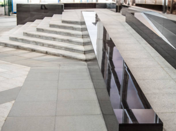 Wheelchair ramp for disabled people at a large modern office building, store. Accessibility for business trips for the disabled.