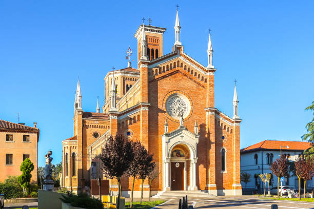 istock Arcitecture of catholic church (Parrocchia di San Lorenzo) in Arcade. 1212955605