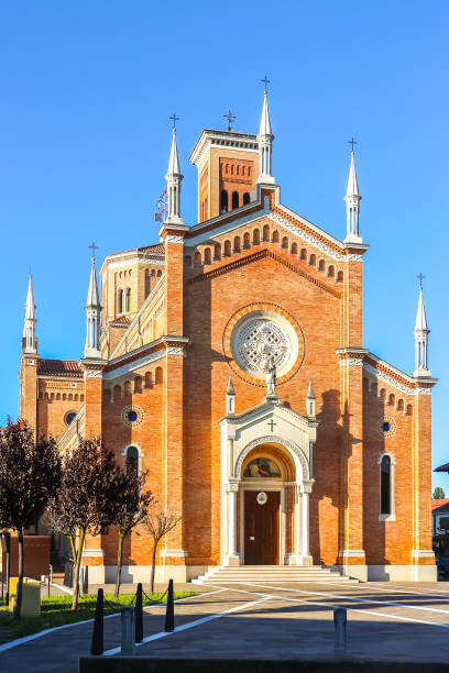 istock Arcitecture of catholic church (Parrocchia di San Lorenzo) in Arcade. 1212956150
