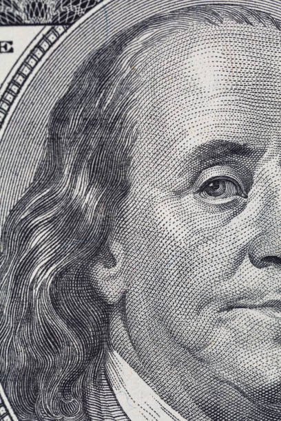 istock fragment of 100 dollar bill 1212956647