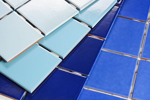 Closeup of a set of samples of tiles in blue gradient.