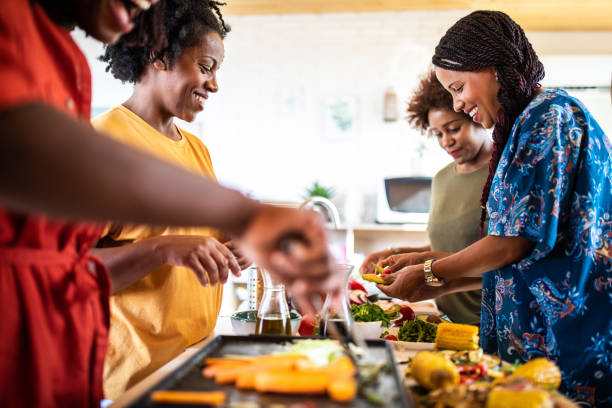 istock African women preparing food 1212960186