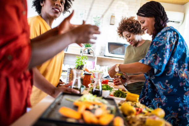 istock African women preparing food 1212960288