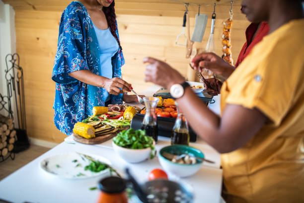 istock Unrecognizable women in the kitchen 1212960991