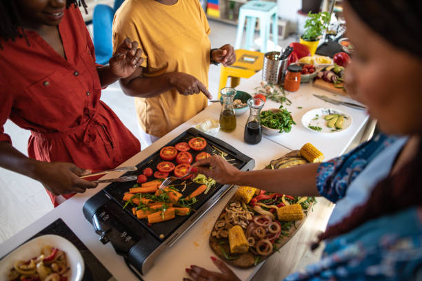 istock Unrecognizable women in the kitchen 1212961137