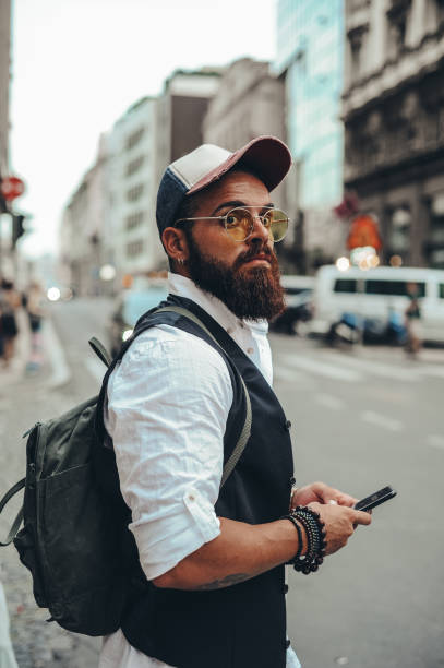 istock Young man calling taxi or Uber 1212962781