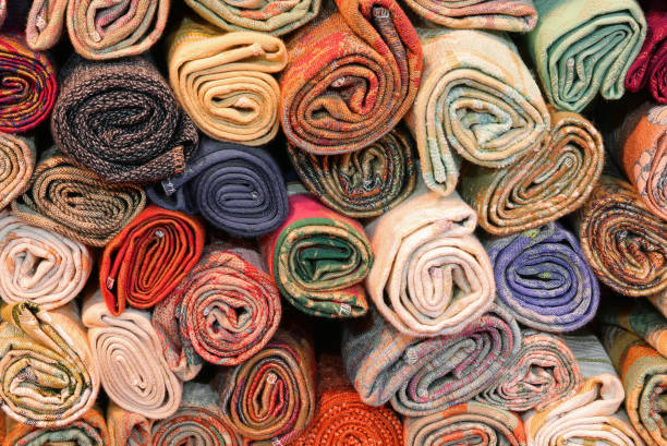 istock rolls of cotton fabrics 1212966134