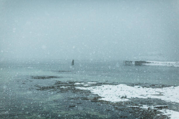 istock View of water against snow. 1212966379