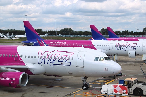 Wizz Air Airbus A320 fleet at London Luton Airport in the UK. It is UK's 5th busiest airport with 16.5 million annual passengers.