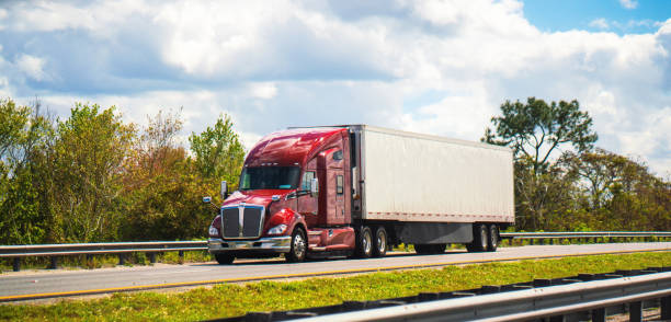 istock Heavy cargo semi truck Florida highway 1212975796
