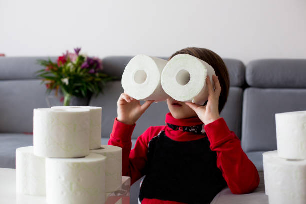istock Child, playing with toilet paper 1212977826
