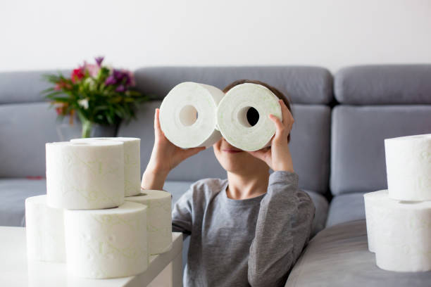 istock Child, playing with toilet paper 1212978534
