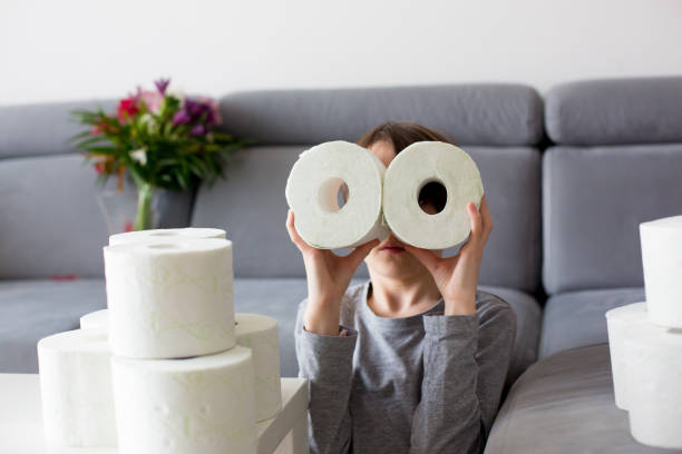 istock Child, playing with toilet paper 1212978558