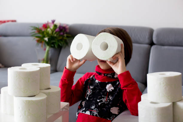 istock Child, playing with toilet paper 1212978638