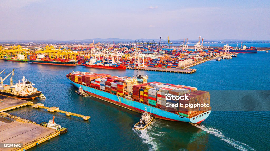 Cargo containers ship logistics transportation Container Ship Vessel Cargo Carrier. import export logistic international export and import services export products worldwide Freight Transportation Stock Photo