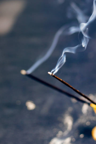 istock Incense Bamboo Stick with smoke,religious purpose. 1212980351