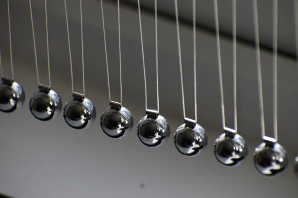 istock Business concept for strategy team work and alignment. Newtons Cradle Pendulum. 1212980616