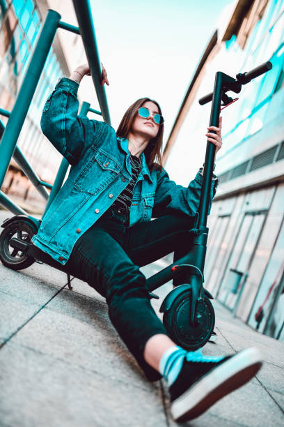 Cute Female And Her Electric Scooter